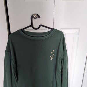 Brand new. Loose fit green sweatshirt.